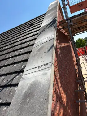 Click Here To Enlarge This Photo Of Lead-Clad Parapet