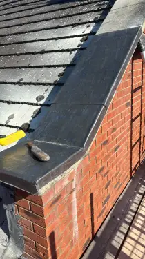 Click Here To Enlarge This Photo Of Lead-Clad Parapet