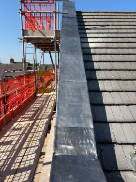Click Here To Enlarge This Photo Of Lead-Clad Parapet
