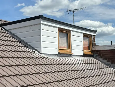 Complete Re-Roof and Dormer Renovation
