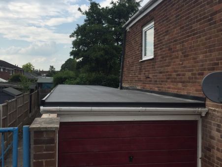 Extended Garage with Rubber Roof